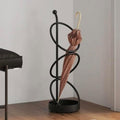 Metal Umbrella Stand At The Entrance, Freestanding Circular Umbrella Holder by Unknown